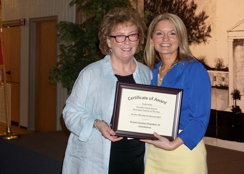 Linda Lewis poses with her award alongside Lauren Goins