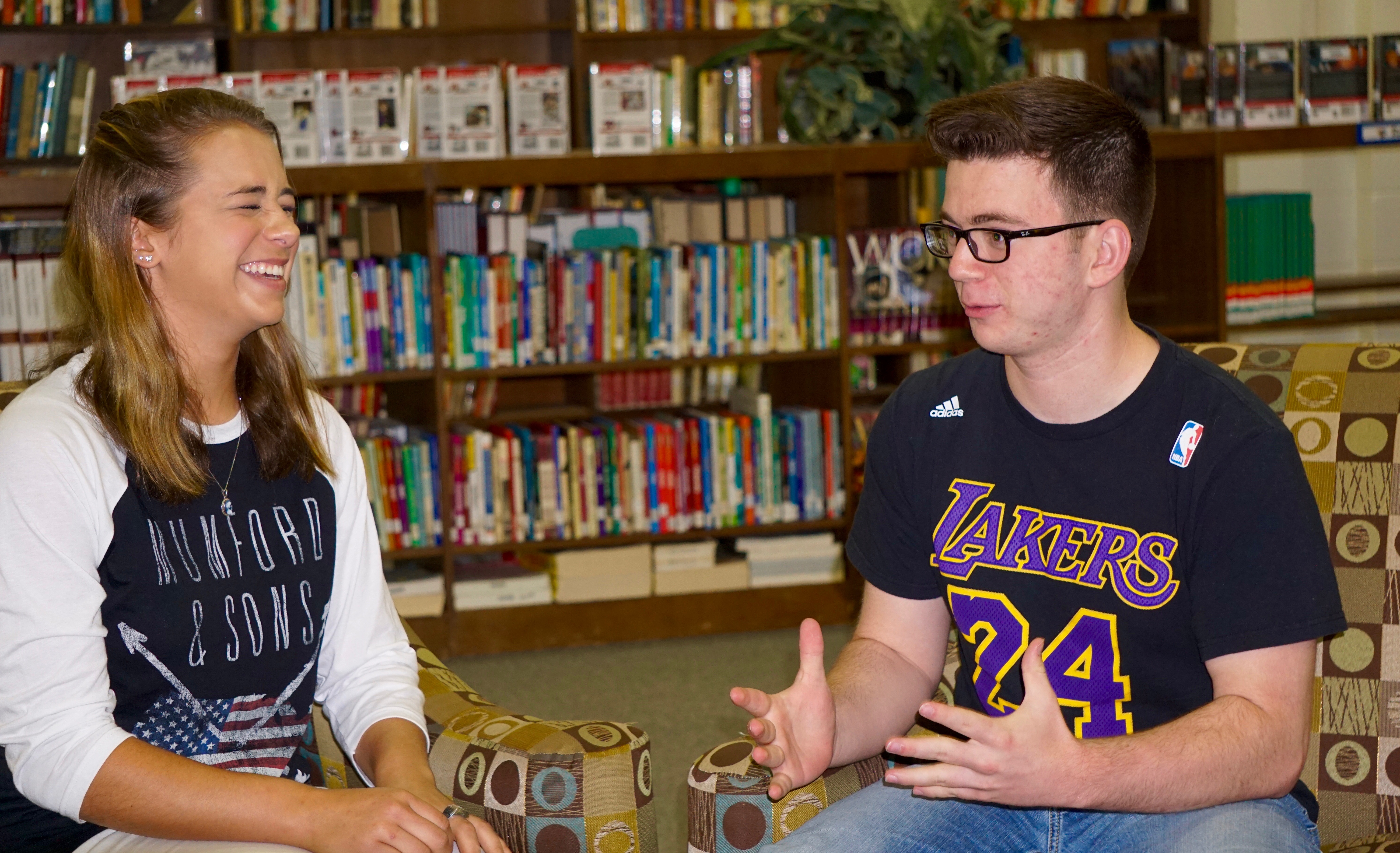 Students Sarah Handloser and Dylan Thompson talking and laughing